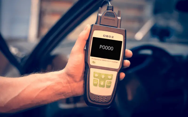 OBD scanner with code P0000 on the screen