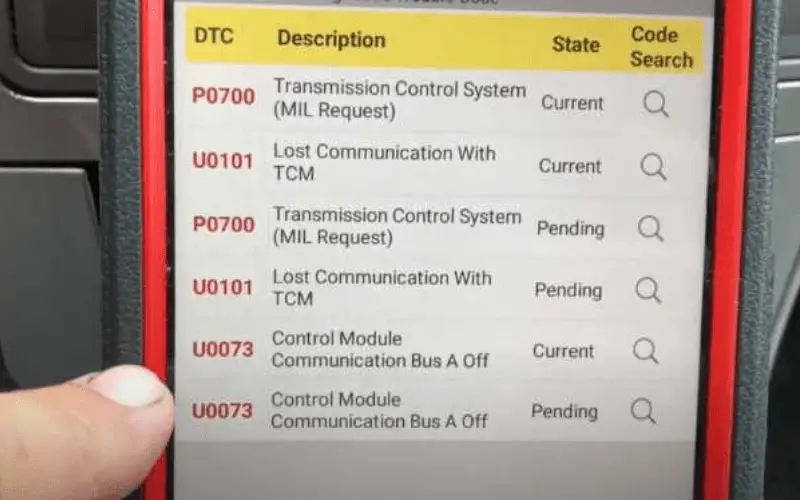 OBD scanner with trouble codes on the screen